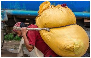 Nepali Man Carrying a Heavy Load